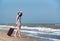 Young beautiful woman during seaside vacation.