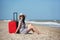 Young beautiful woman during seaside vacation.