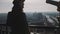 Young beautiful woman on top of Eiffel Tower Paris view panorama walking up to the edge, posing at camera slow motion.