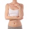 Young beautiful woman in white t-shirt top bra hands belly stomach health beauty