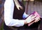 Young beautifulbusiness woman journalist sitting awaiting a meeting. In negotiations with the diary for notes