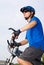 Young bicyclist in helmet