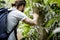 Young Biologist working in a tropical forest