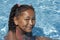 Young black girl in swimming pool