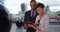 Young black male and female corporate colleagues check stock on pad device