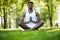 Young black man practicing yoga