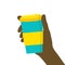 Young Black man woman hand holding reusable travel coffee cup mug of turquoise color with yellow lid non slip sleeve