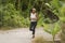 Young black  runner girl enjoying outdoors jogging workout - young attractive and fit African American woman running at