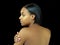 Young black woman bare back profile portrait
