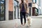 Young blind man with stick and guide dog walking