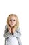 Young blond girl with funny expression shrugging shoulders