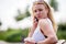 Young blond girl talking on cell phone. Facial expressions