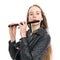 Young blond teen girl and piccolo flute in studio against white background