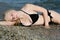 young blond woman in bikini, lie down on the sides