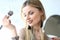 Young Blond Woman Cosmetologist Closeup Portrait