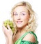Young blond woman with grape