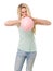 Young blond woman inflating balloon