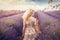 Young blond woman in lavender field Happy carefree AI generated