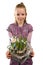 Young blonde girl with Muscari botryoides