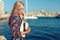 Young blonde Italian romantic woman at Mediterranean sea