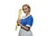 Young blonde maid puts on rubber gloves on white background.