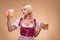 Young blonde wearing dirndl