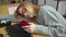 Young blonde woman business worker tired using smartphone at office