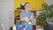 Young blonde woman professional cleaner standing with arms crossed gesture at the office