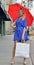 Young blonde woman shopping downtown