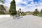 Young BMX bicycle rider doing tricks in park outdoor