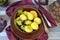 Young boiled potatoes in bowl, russian style, flat lay
