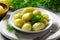 Young boiled potatoes with dill, parsley and onions