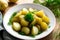 Young boiled potatoes with dill, parsley and onions