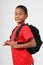 Young boy 9 ready for school with his back pack