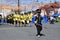 Young boy acts as Band leader leads his musical team during the annual brass band exhibition in honor of Patron Saint Paul the Fir