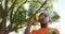 Young boy blowing bubbles through bubble wand