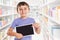 Young boy child pointing at tablet computer library information marketing ad advertising