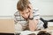 Young boy concentrating on his studies at home