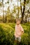 Young boy contemplating in the woods