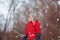 Young boy in countryside smiles in winer snow day