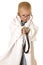 Young boy doctor holding out a stethoscope