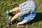 Young Boy Doing Somersault on Summer Grass