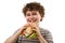 Young boy eating healthy sandwich