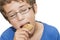 Young boy enjoying a delicious cookie, eyes closed expression of
