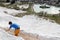 Young boy explore Pamukkale white limestone travertines and enjoy warm mineral water