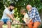 Young boy with father and grandfather enjoying together in park. Generations men. Boy with father and grandfather