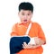 Young Boy With Fractured Hand In Plaster Cast