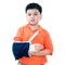 Young Boy With Fractured Hand In Plaster Cast