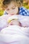 Young Boy Gazing at His Newborn Baby Girl Sister