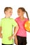 Young boy and girl holding a soccer ball with an attitude